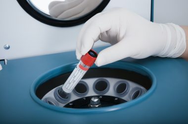 Woman working in dental laboratory